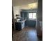 Functional kitchen featuring essential appliances and convenient storage solutions at 19645 E Buchanan Pl, Aurora, CO 80011