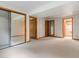 Finished basement with multiple rooms and carpeting at 2040 Yarrow St, Lakewood, CO 80214