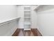 Walk-in closet with shelves and hanging bars at 2040 Yarrow St, Lakewood, CO 80214