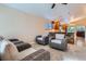 Comfortable living area with neutral tones and open layout to the kitchen at 5191 S Nepal Way, Centennial, CO 80015