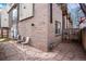 Brick patio with outdoor seating and fenced yard at 1632 N Gilpin St, Denver, CO 80218