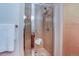 Bathroom shower featuring stylish tile and modern shower fixtures at 1632 N Gilpin St, Denver, CO 80218