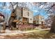 Modern two-story home with unique architectural details and a well-maintained front yard at 1632 N Gilpin St, Denver, CO 80218