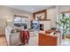 Inviting living room with a fireplace, hardwood floors, and a sliding door to a balcony at 1632 N Gilpin St, Denver, CO 80218