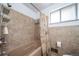 Neutral colored bathroom with a tub and a shower at 6625 S Ogden St, Centennial, CO 80121