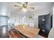 Bright dining room features a wooden table and ceiling fan at 6625 S Ogden St, Centennial, CO 80121