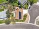 Aerial view of a well-maintained home with solar panels, surrounded by mature trees and landscaping at 3298 W 11Th Avenue Pl, Broomfield, CO 80020