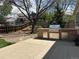 Outdoor kitchen with a stainless steel grill, set on a concrete patio, perfect for entertaining in the fenced yard at 3298 W 11Th Avenue Pl, Broomfield, CO 80020