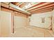 Unfinished basement with exposed ceiling, offering a blank canvas for your creative ideas at 3298 W 11Th Avenue Pl, Broomfield, CO 80020