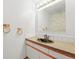 Bathroom featuring copper sink with white cabinets and subway tile at 3298 W 11Th Avenue Pl, Broomfield, CO 80020