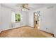 Bright dining room with neutral carpet, window and open view into kitchen at 3298 W 11Th Avenue Pl, Broomfield, CO 80020
