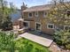 Exterior backyard view features a spacious yard, patio, and built-in outdoor kitchen at 3298 W 11Th Avenue Pl, Broomfield, CO 80020