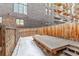 Private backyard with a deck and a wooden fence at 2512 Kensing Ct, Denver, CO 80211