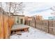 Small backyard with a deck and partial view of the city at 2512 Kensing Ct, Denver, CO 80211