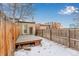 Small backyard with a deck and partial view of the city at 2512 Kensing Ct, Denver, CO 80211
