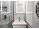 Modern bathroom with a walk-in shower, marble tile and a vanity at 2512 Kensing Ct, Denver, CO 80211