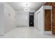 Bright entryway with tile floors, built-in storage, and a modern feel at 2512 Kensing Ct, Denver, CO 80211