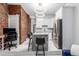 Modern kitchen with white cabinets, marble countertops, and stainless steel appliances at 2512 Kensing Ct, Denver, CO 80211