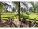 Fenced backyard includes a storage area for firewood at 4 Oakmont Ln, Littleton, CO 80127
