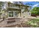Home backyard features a picnic table and fenced yard at 4 Oakmont Ln, Littleton, CO 80127