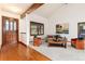 Bright living room with hardwood floors, vaulted ceilings, and neutral decor at 4 Oakmont Ln, Littleton, CO 80127