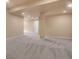 Finished basement space featuring neutral paint, recessed lighting, and gray carpeting at 892 High Point Trl, Elizabeth, CO 80107