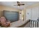 Bedroom with a built-in murphy bed and a rocking chair at 892 High Point Trl, Elizabeth, CO 80107