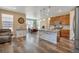 Spacious kitchen with a large center island, stainless steel appliances, and an adjacent dining area at 892 High Point Trl, Elizabeth, CO 80107