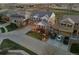 Beautiful two-story home with a large driveway, three cars parked and a well-manicured lawn at 1609 S Catawba Cir, Aurora, CO 80018