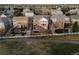 Beautiful two-story home featuring a spacious backyard with a covered patio and a white picket fence at 1609 S Catawba Cir, Aurora, CO 80018