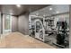 Well-equipped home gym with various exercise machines and ample space for workouts at 1609 S Catawba Cir, Aurora, CO 80018
