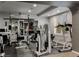 Bright home gym with ample exercise equipment and rubber flooring for fitness enthusiasts at 1609 S Catawba Cir, Aurora, CO 80018