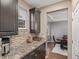 Kitchen with granite countertops and stainless steel appliances at 1609 S Catawba Cir, Aurora, CO 80018