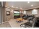 Inviting living room featuring a fireplace and entertainment center at 1609 S Catawba Cir, Aurora, CO 80018