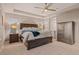 The main bedroom features a tray ceiling and carpeted floors at 1609 S Catawba Cir, Aurora, CO 80018