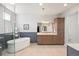 Modern bathroom featuring a soaking tub, glass shower, and double vanities at 4745 Mesa Top Dr, Monument, CO 80132