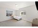 Spacious bedroom with white walls and gray carpeting showcasing a scenic view at 4745 Mesa Top Dr, Monument, CO 80132