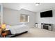 Neutral bedroom with a bed, tv, and mountain views at 4745 Mesa Top Dr, Monument, CO 80132