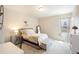 Cozy bedroom with a carpeted floor, a single bed, a desk and natural light at 4745 Mesa Top Dr, Monument, CO 80132