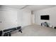 Bonus room features large closets and a tv, that could be used as an office space or additional bedroom at 4745 Mesa Top Dr, Monument, CO 80132