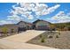 A charming home featuring a spacious driveway and a beautifully landscaped front yard with meticulous curb appeal at 4745 Mesa Top Dr, Monument, CO 80132