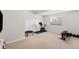 Home gym equipped with stationary bike, weights and trampoline, offering a dedicated workout space at 4745 Mesa Top Dr, Monument, CO 80132