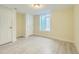 Finished basement bedroom with new flooring and a window at 8501 E 104Th Ave, Henderson, CO 80640