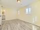 Bedroom with light yellow walls and vinyl flooring at 8501 E 104Th Ave, Henderson, CO 80640