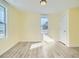 Well-lit bedroom with hardwood floors and closet at 8501 E 104Th Ave, Henderson, CO 80640