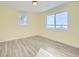 Bright bedroom with hardwood floors and large windows at 8501 E 104Th Ave, Henderson, CO 80640