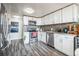 Modern kitchen featuring stainless steel appliances, granite countertops, and sleek cabinetry at 1155 N Ash St # 806, Denver, CO 80220