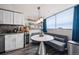 Charming kitchen with breakfast nook with views, and sleek, stainless appliances at 1155 N Ash St # 806, Denver, CO 80220