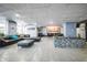 Elegant lobby area with modern seating, tile floors, and artwork, perfect for welcoming guests at 1155 N Ash St # 806, Denver, CO 80220