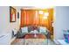 Cozy room featuring a sofa, area rug, and natural lighting at 1155 N Ash St # 806, Denver, CO 80220
